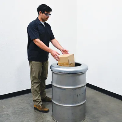 Vestil CAN-BH-5516-GALV galvanized steel drum cover shown from an alternate angle