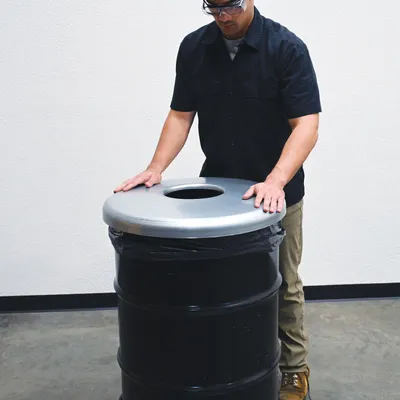 Vestil CAN-BH-558-GALV galvanized steel drum cover shown from an alternate angle