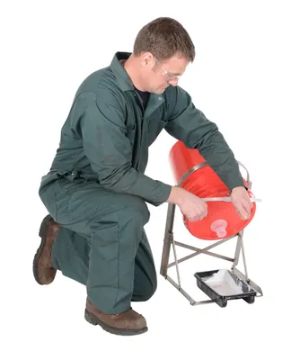 Vestil CAN-S manual pail tipper shown from an alternate angle