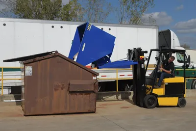 Vestil D-200-LD d style - self-dumping steel hoppers with bumper release shown from an alternate angle