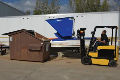 Vestil D-200-MD d style - self-dumping steel hoppers with bumper release shown from an alternate angle