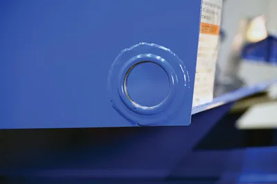 Vestil D-DPLG-2 d style - self-dumping steel hoppers with bumper release shown from an alternate angle