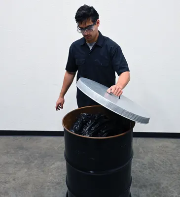 Vestil DC-245-H galvanized steel drum cover shown from an alternate angle