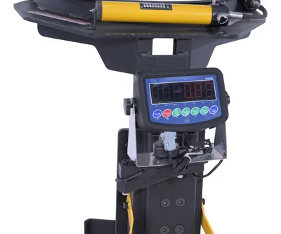 Vestil DGPS-55-SCL fork mounted drum gripper w digital scale shown from an alternate angle