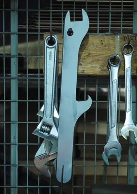 Vestil DRUM-PLB drum lid tool shown from an alternate angle