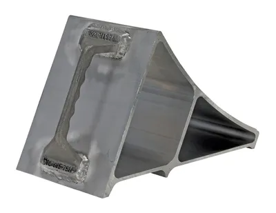 Vestil EALUM-7-HNDG aluminum wheel chock shown from an alternate angle