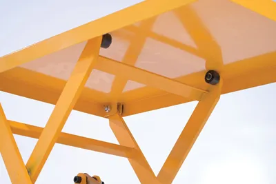 Vestil EMLT-200 steel linear actuated scissor lift table shown from an alternate angle