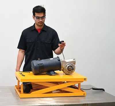 Vestil EMLT-200 steel linear actuated scissor lift table shown from an alternate angle
