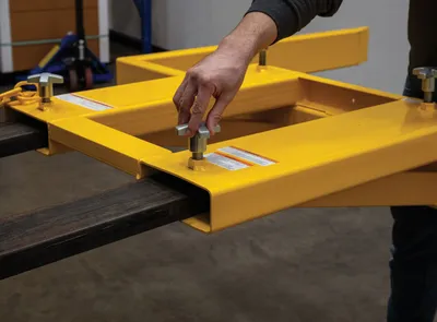 Vestil FLDM-2-72 fork mounted front load dumpster mover shown from an alternate angle