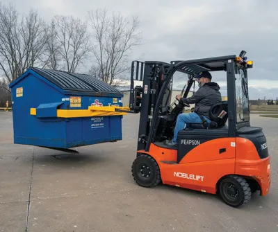 Vestil FLDM-2-72 fork mounted front load dumpster mover shown from an alternate angle