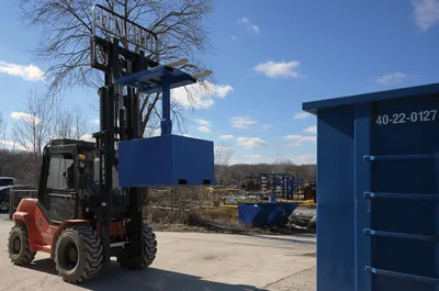 Vestil FWBC-4242-4-BC fork mounted trash bin compactor shown from an alternate angle