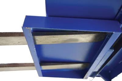 Vestil HDROP-100-LD self-dumping steel hoppers with fold down front shown from an alternate angle