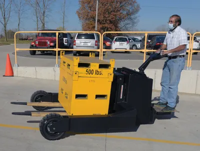 Vestil RT-EPT-2.5-60-TLT rough terrain tilting electric pallet truck shown from an alternate angle