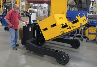 Vestil RT-EPT-2.5-60-TLT rough terrain tilting electric pallet truck shown from an alternate angle