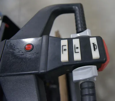 Vestil RT-EPT-2.5-60-TLT rough terrain tilting electric pallet truck shown from an alternate angle